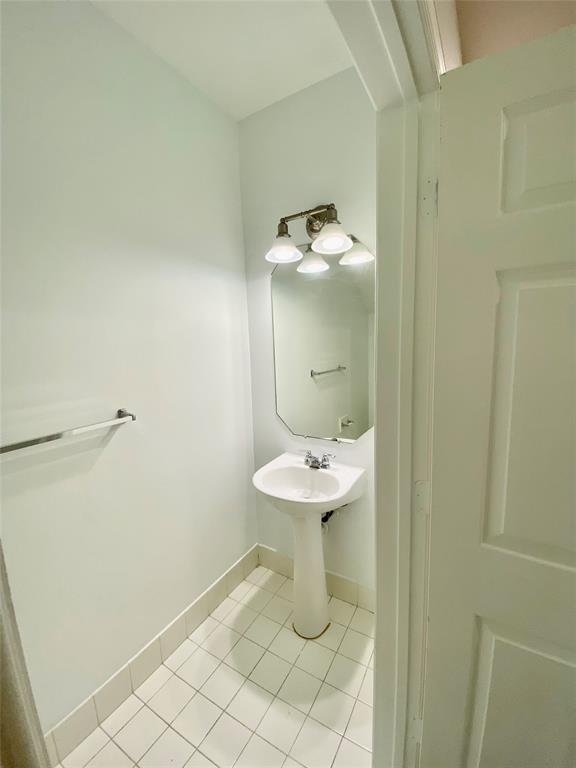 8720 Cypress Walk Court, Unit 8720 Tamarac, FL 33321 - Photo 10 of 36 a bathroom with a sink toilet and mirror