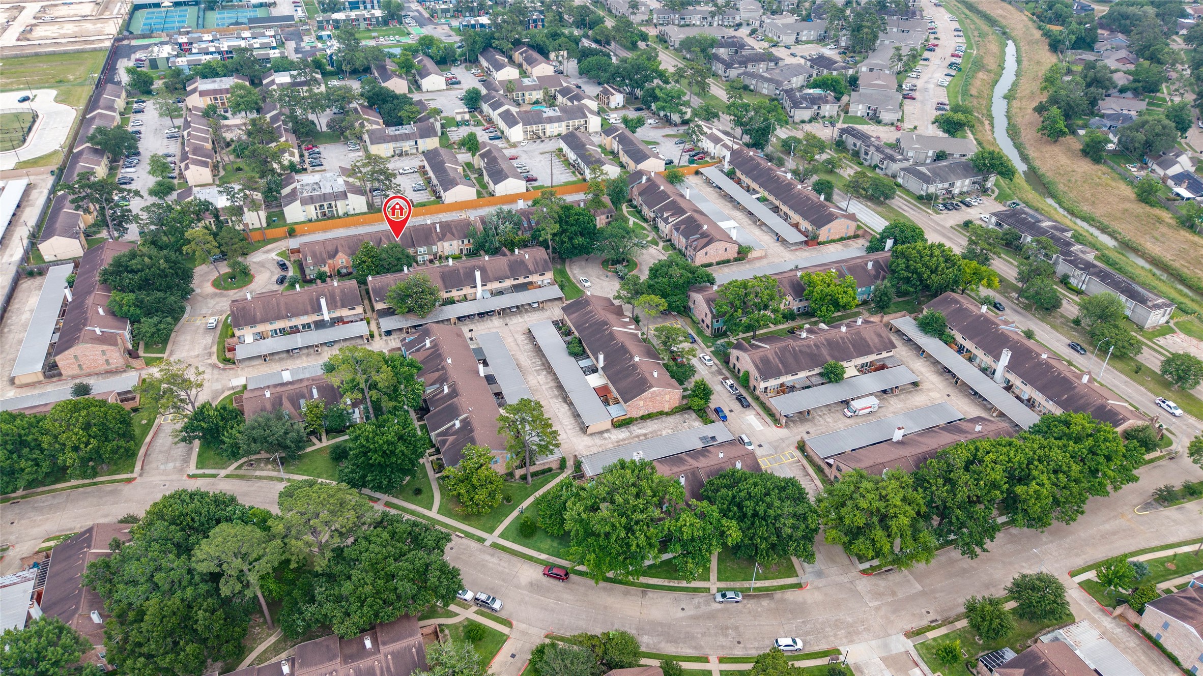 5800 Lumberdale Road, Unit 55 Houston, TX 77092 - Photo 27 of 34 an aerial view of a city with lots of residential buildings