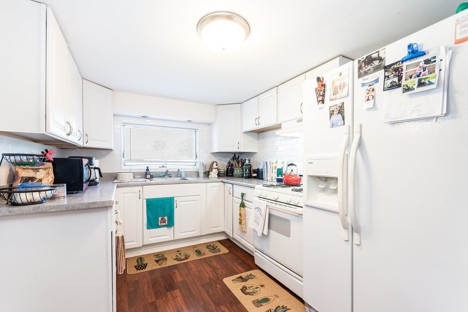 341 West Kennedy Road Braidwood, IL 60408 - Photo 7 of 15 a kitchen with stainless steel appliances granite countertop a refrigerator sink and white cabinets