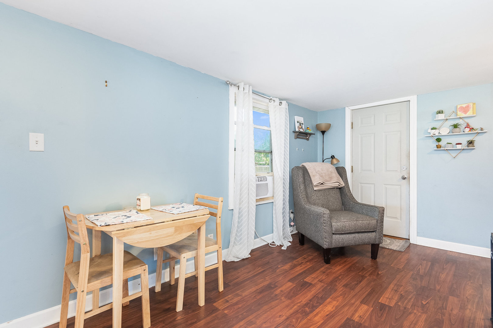 341 West Kennedy Road Braidwood, IL 60408 - Photo 10 of 15 a view of a livingroom with furniture and wooden floor