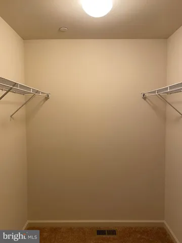 a view of small space with racks on the wall