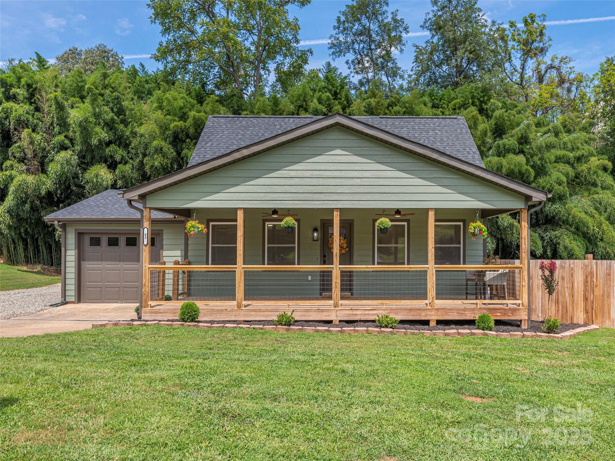 93 Cresthaven Drive Clyde, NC 28721 - Photo 1 of 27 front view of a house with a yard