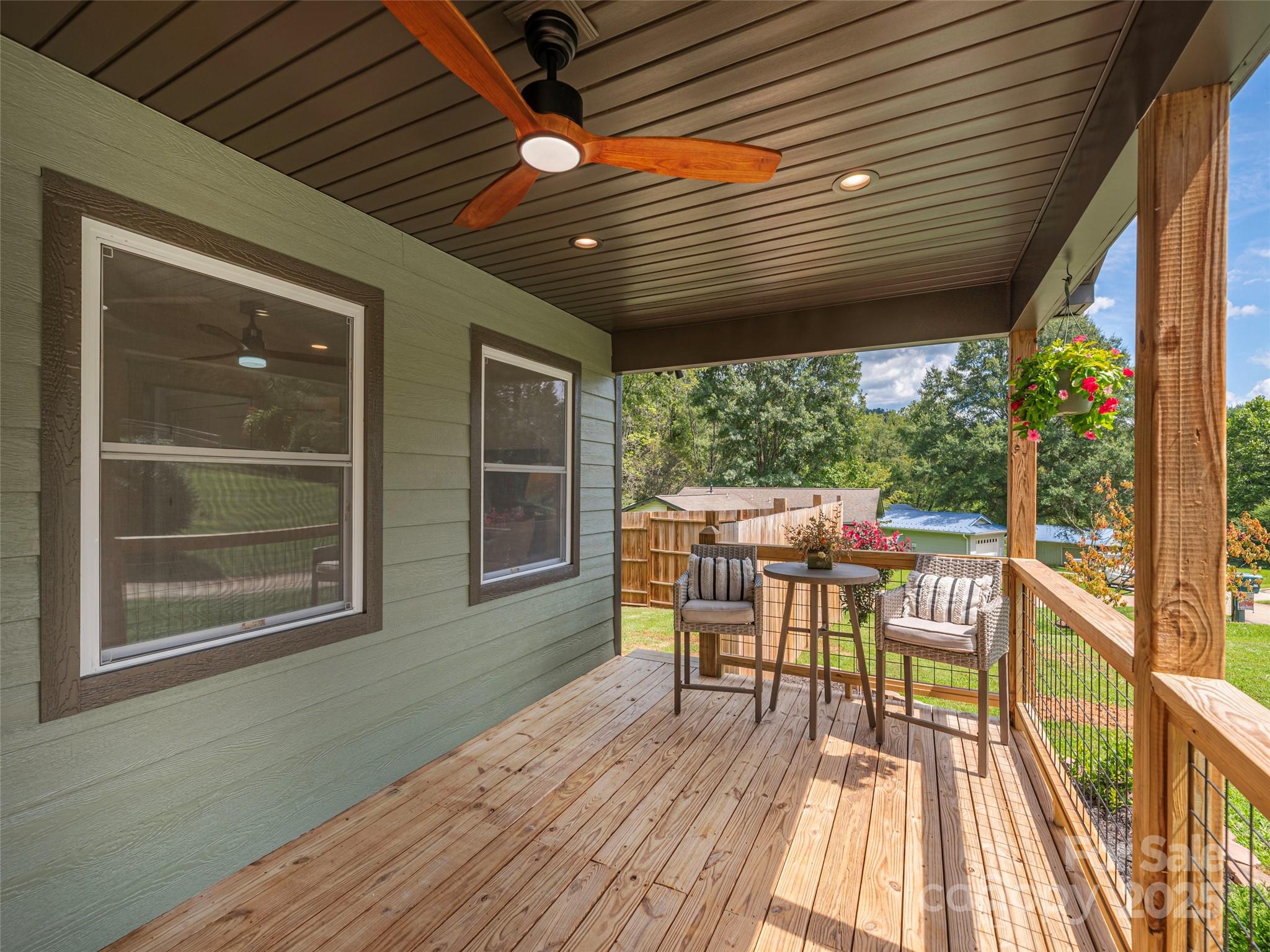 93 Cresthaven Drive Clyde, NC 28721 - Photo 5 of 27 a view of a chairs and table in the balcony