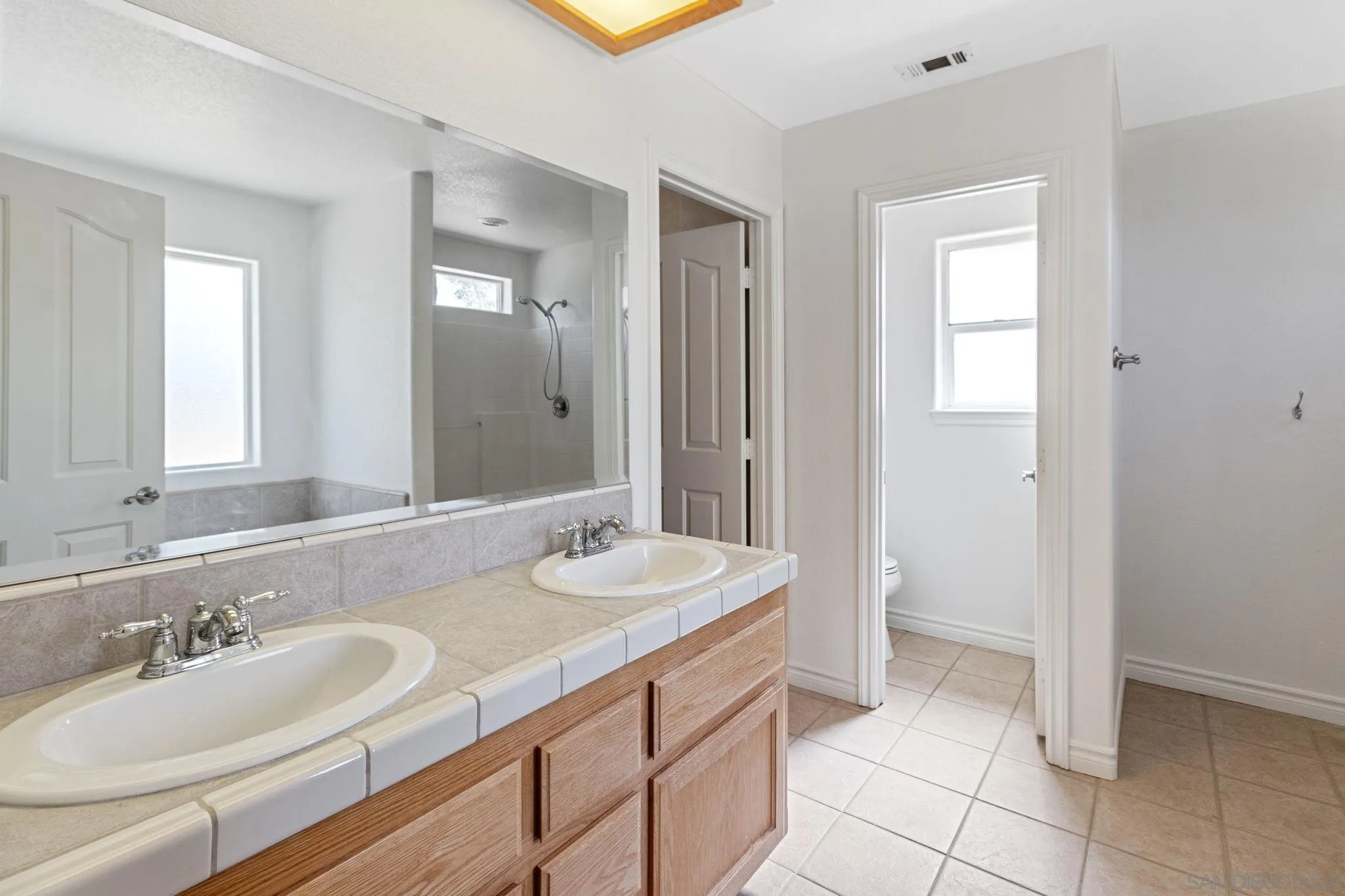 9520 Lebec Road Phelan, CA 92371 - Photo 14 of 27 a bathroom with a sink and a mirror