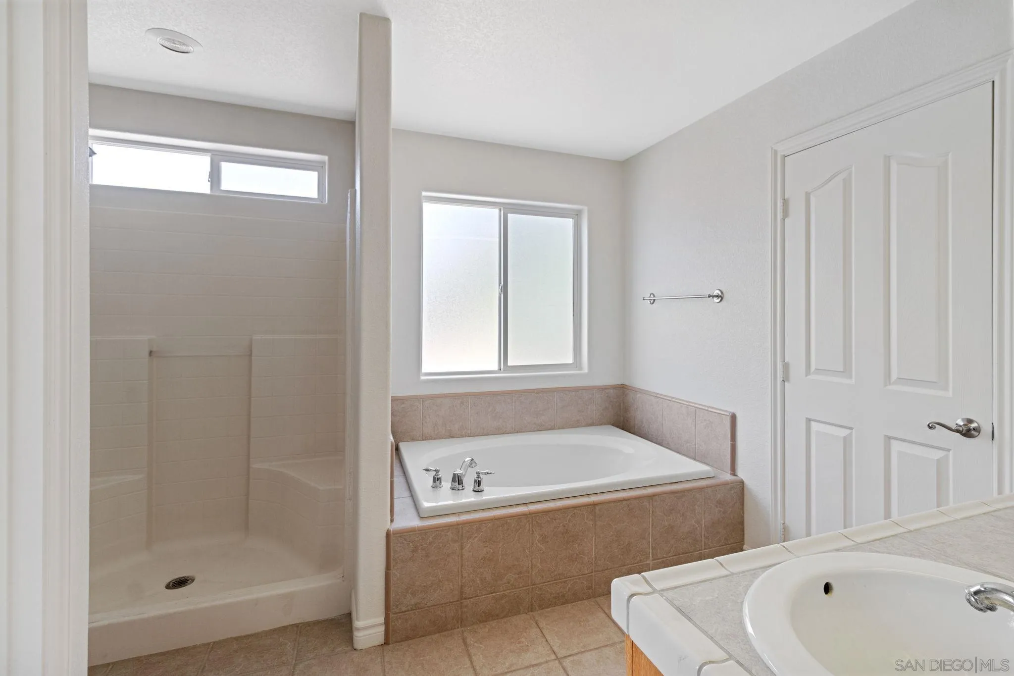 9520 Lebec Road Phelan, CA 92371 - Photo 17 of 27 a bathroom with a tub and a shower