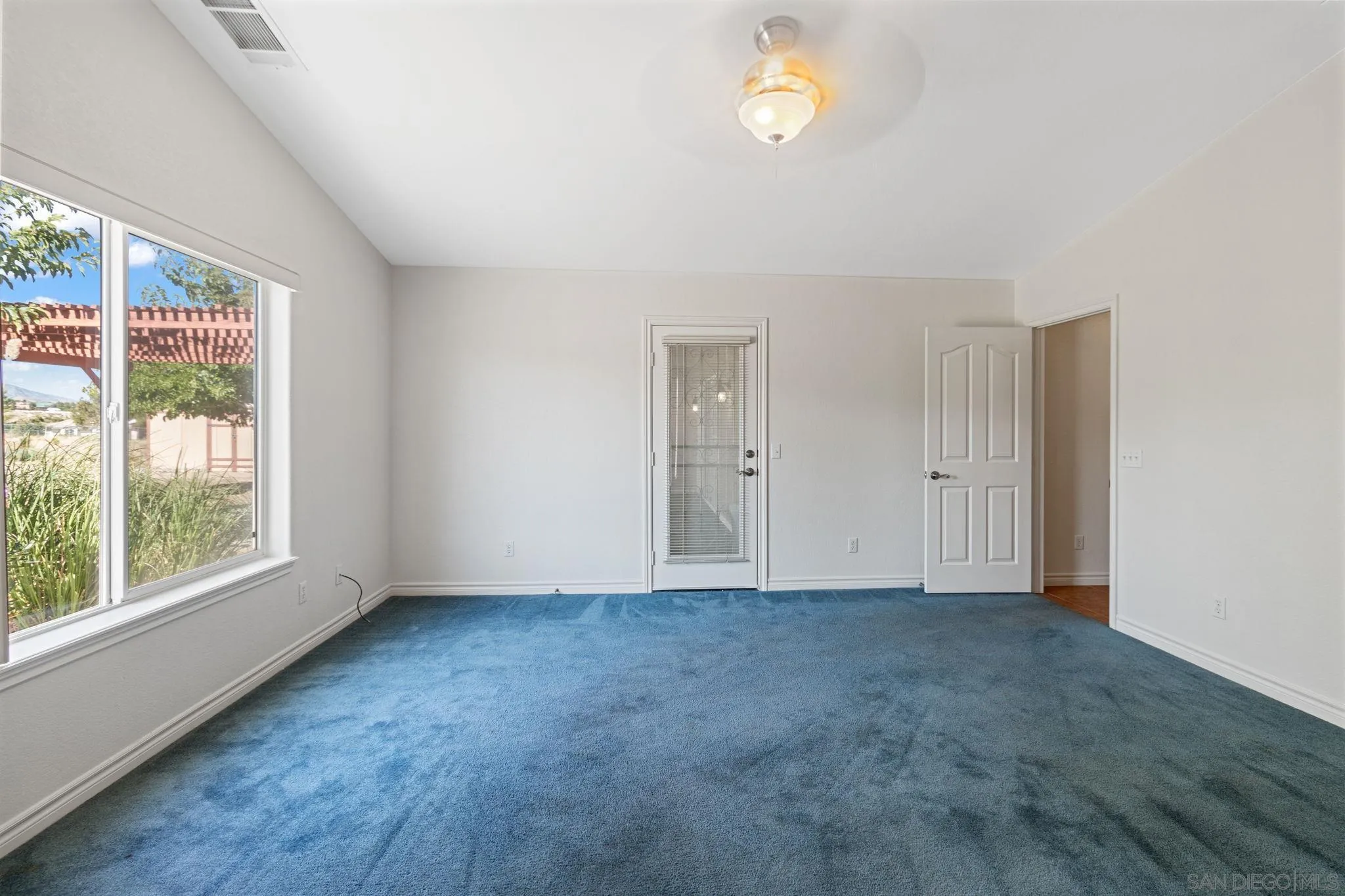 9520 Lebec Road Phelan, CA 92371 - Photo 18 of 27 a view of an empty room with a window