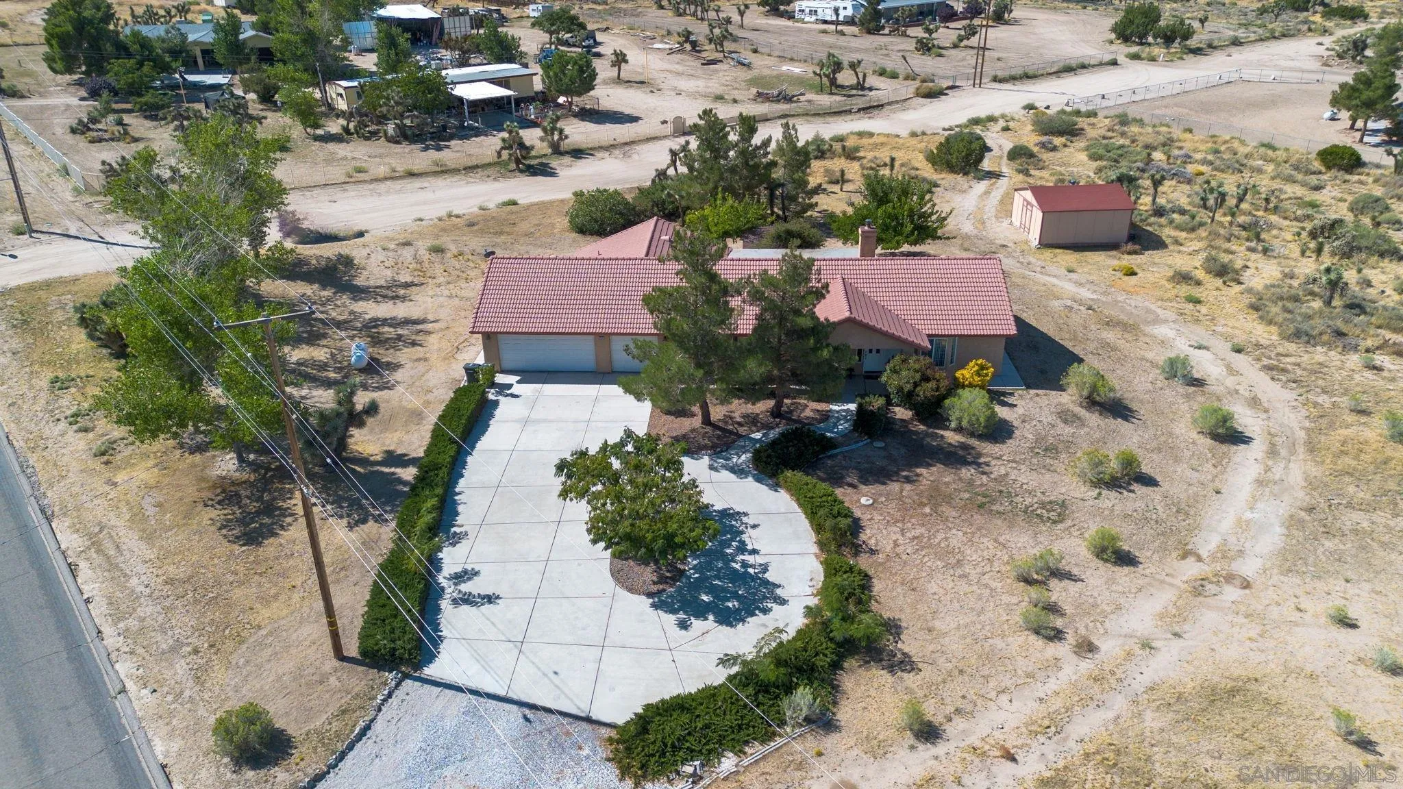 9520 Lebec Road Phelan, CA 92371 - Photo 27 of 27 an aerial view of house with yard