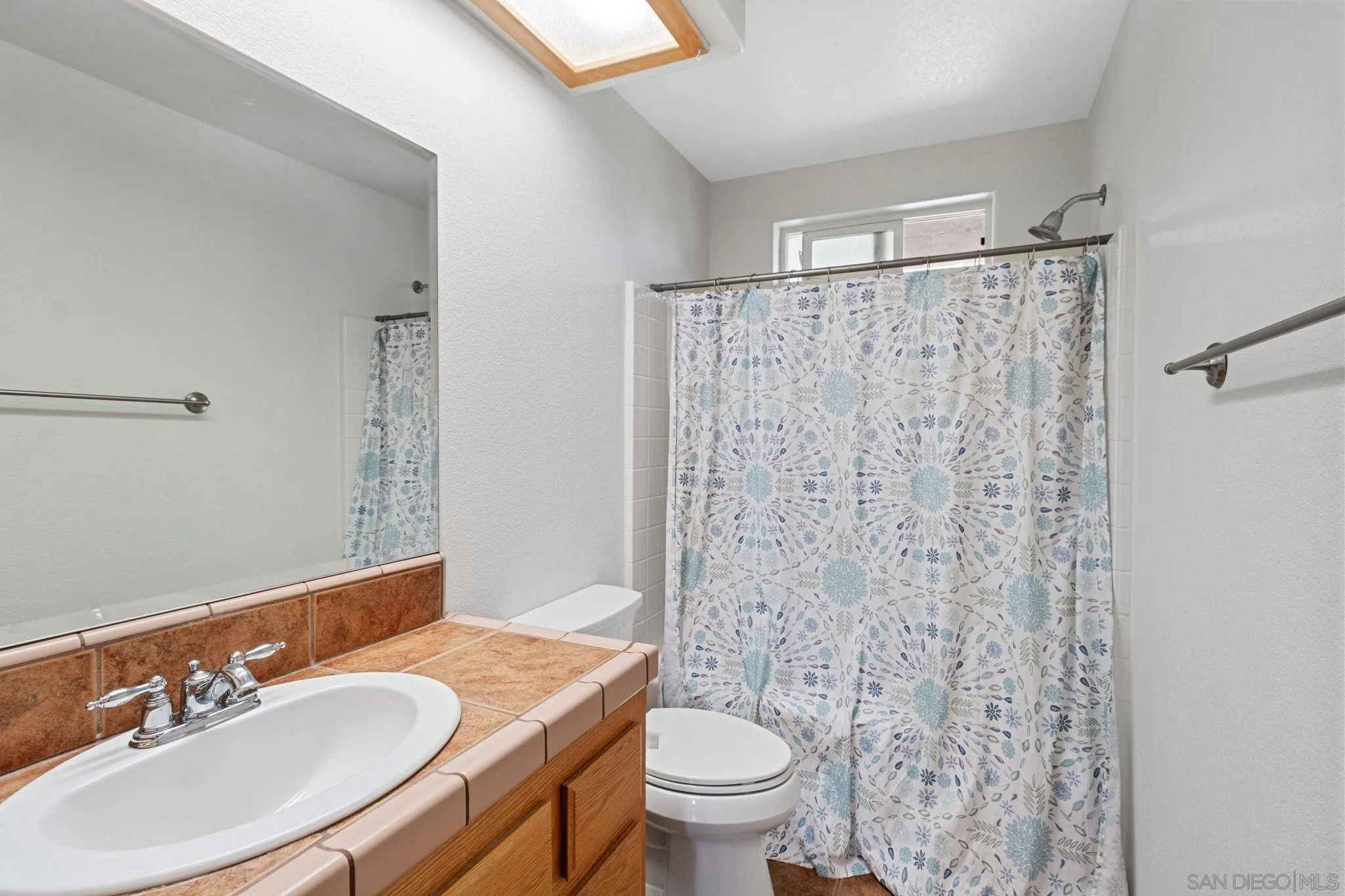 9520 Lebec Road Phelan, CA 92371 - Photo 10 of 27 a bathroom with a sink toilet and shower