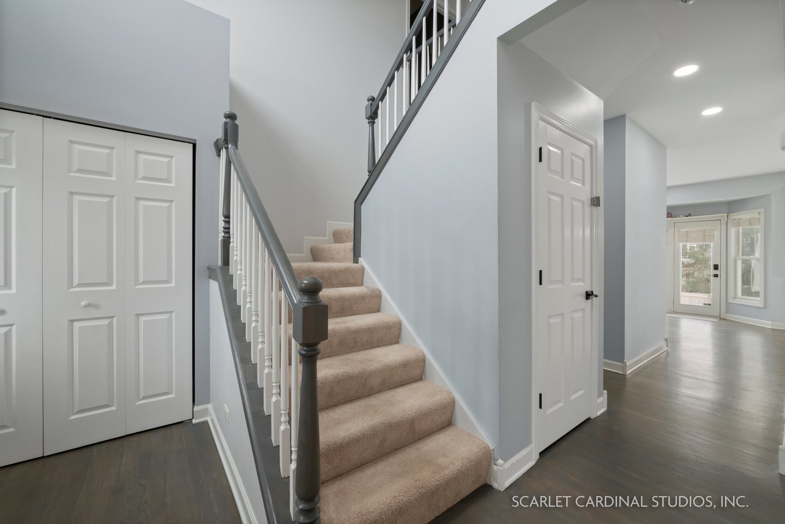 184 Prescott Drive Bartlett, IL 60103 - Photo 2 of 30 a view of a hallway with wooden floor and entryway