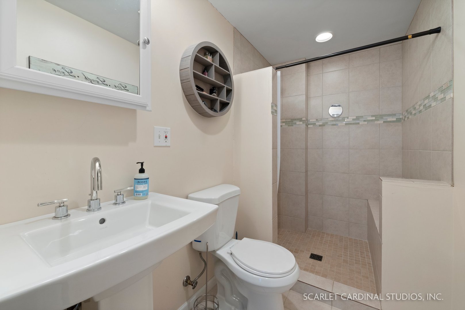 184 Prescott Drive Bartlett, IL 60103 - Photo 23 of 30 a bathroom with a sink toilet and a shower