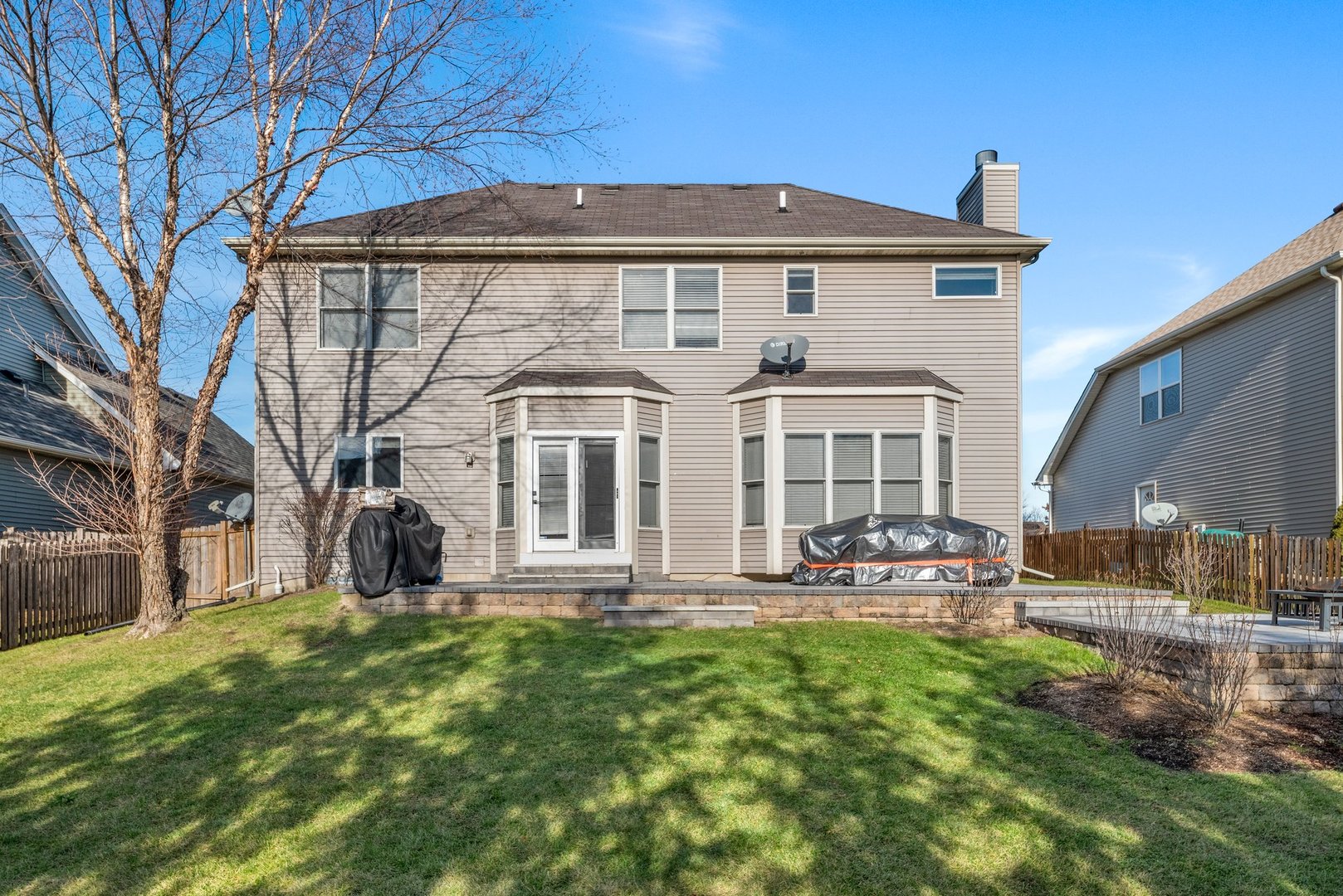 184 Prescott Drive Bartlett, IL 60103 - Photo 27 of 30 a front view of a house with a yard