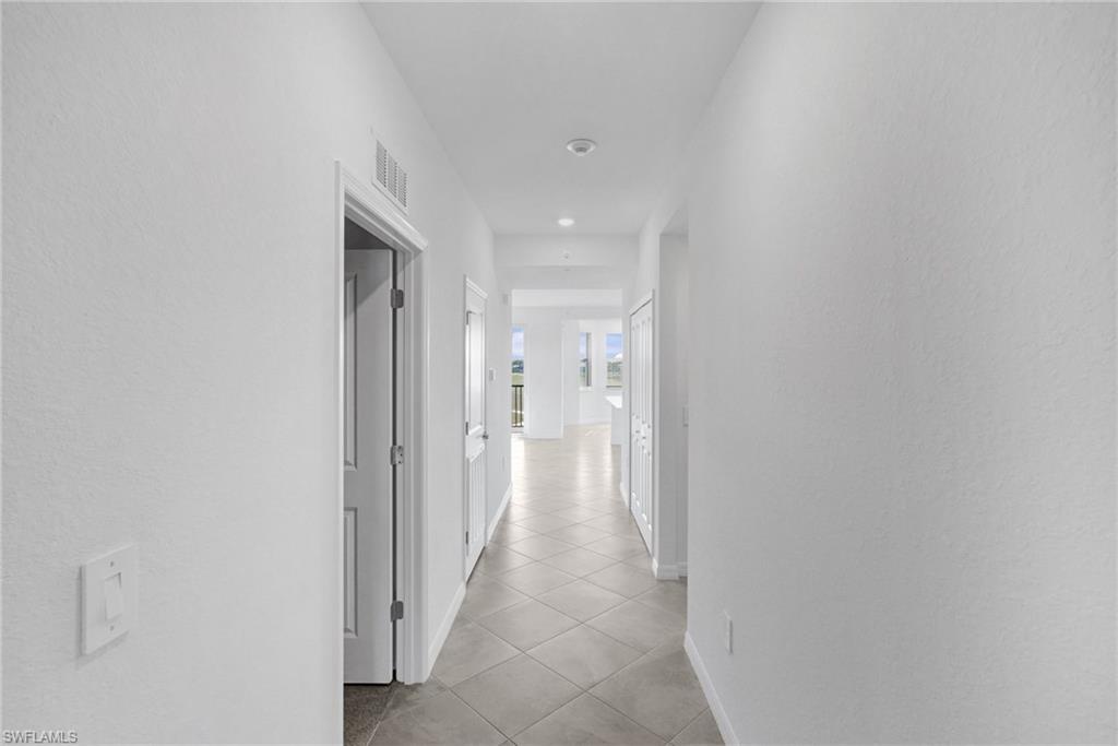 15375 Grn Acrs Avenue, Unit 2227 Babcock Ranch, FL 33982 - Photo 22 of 22 a view of a hallway