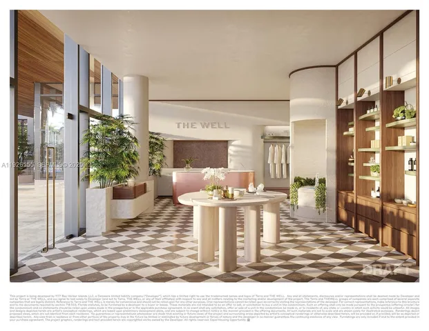 a view of a living room and kitchen