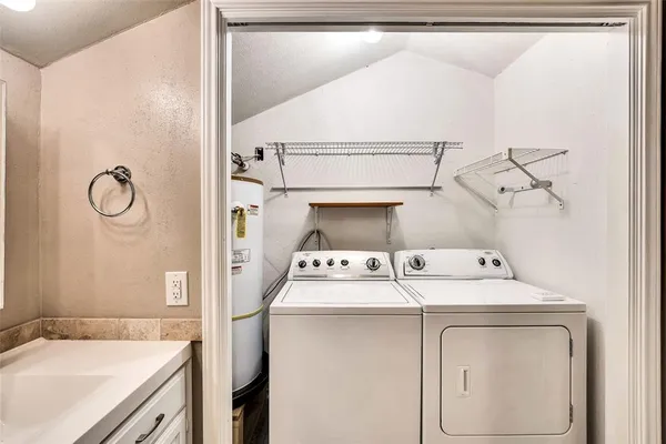 a utility room with dryer and washer