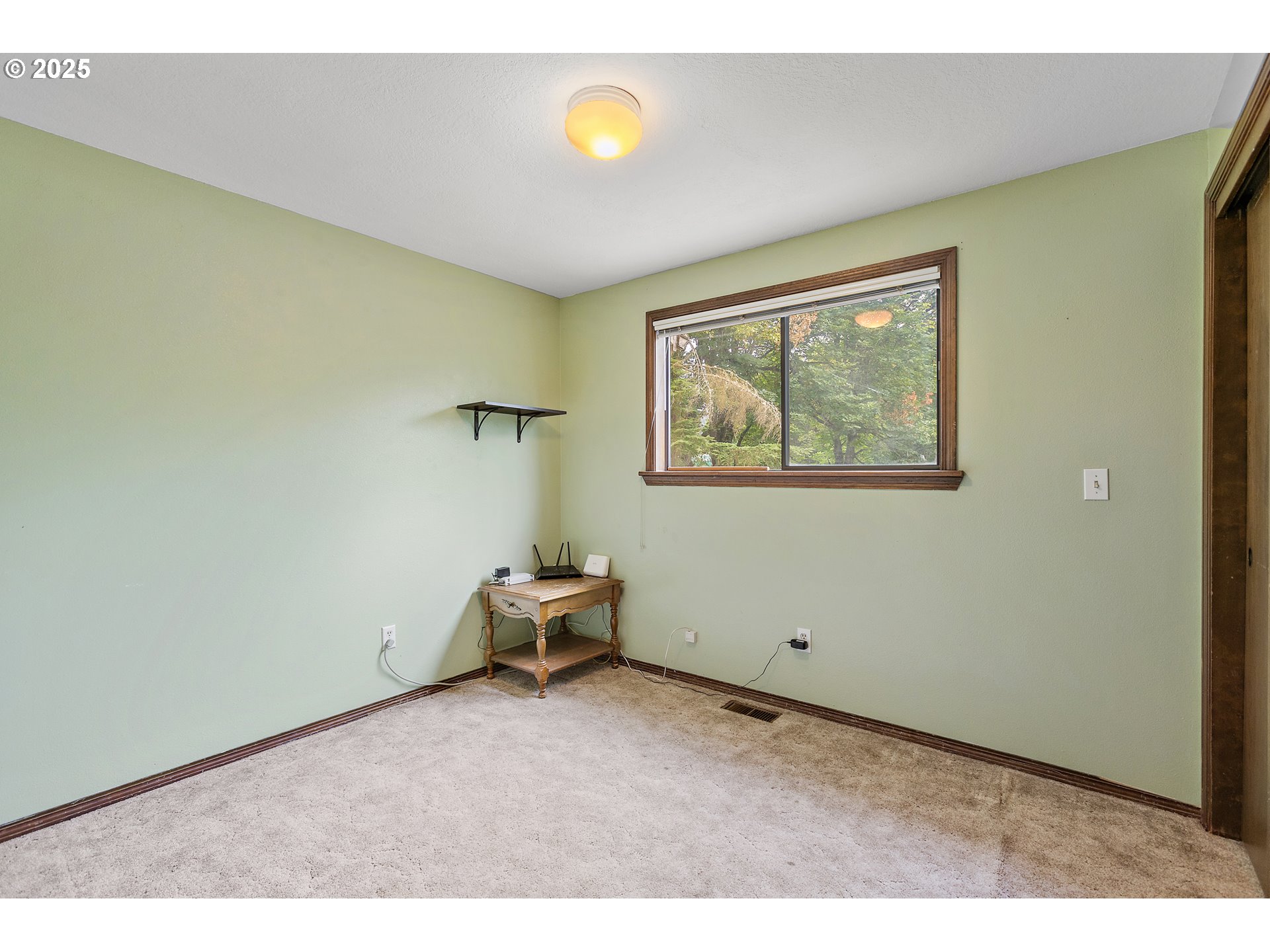20154 Southeast Foster Road Damascus, OR 97089 - Photo 11 of 40 a view of empty room with windows