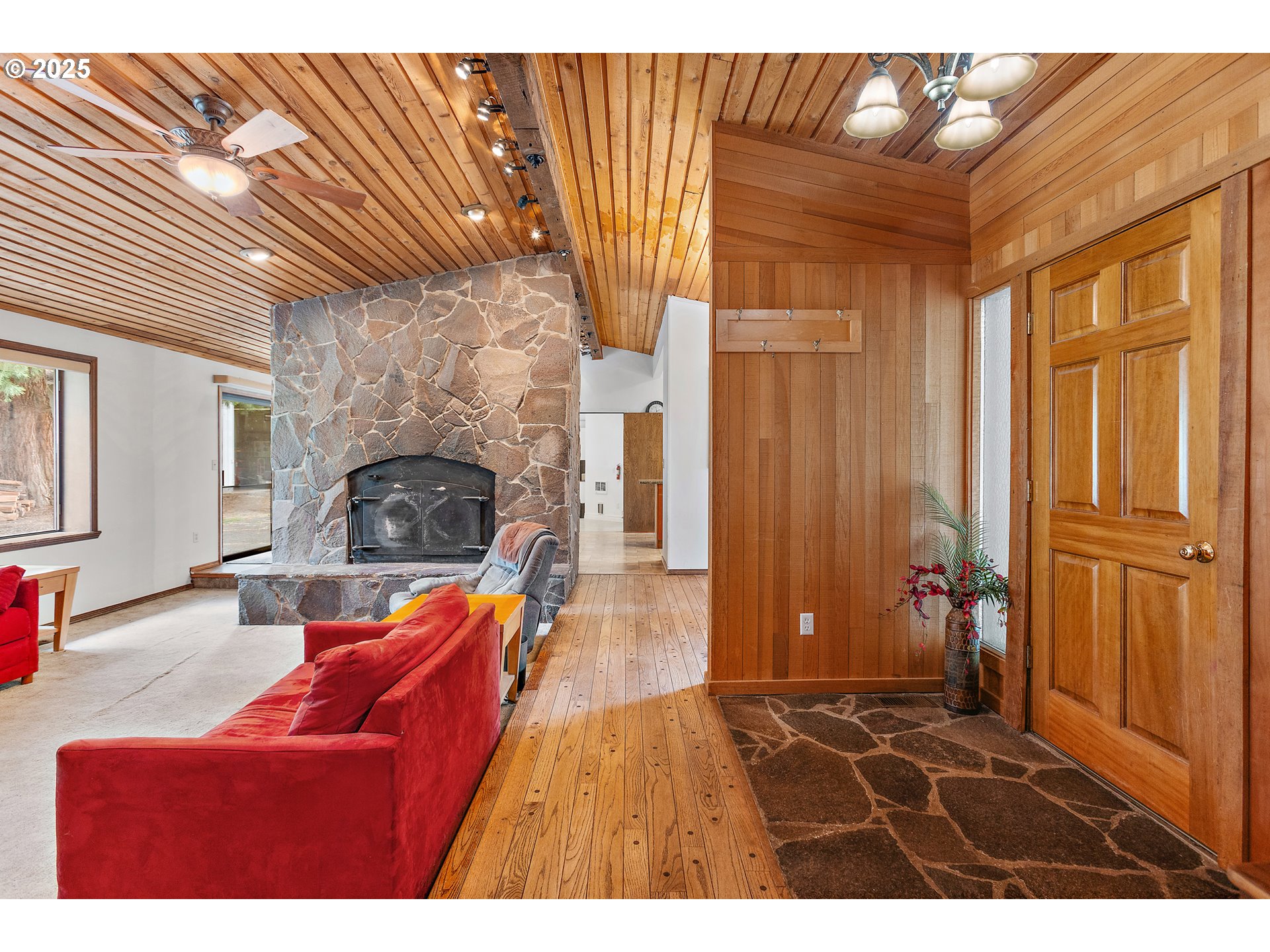20154 Southeast Foster Road Damascus, OR 97089 - Photo 25 of 40 a living room with furniture and a fireplace