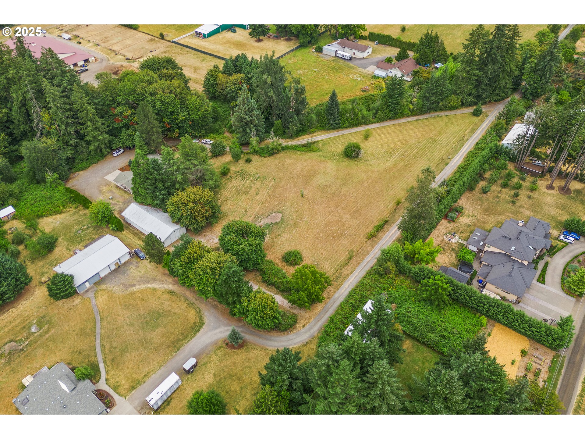 20154 Southeast Foster Road Damascus, OR 97089 - Photo 30 of 40 an aerial view of residential houses with outdoor space and river