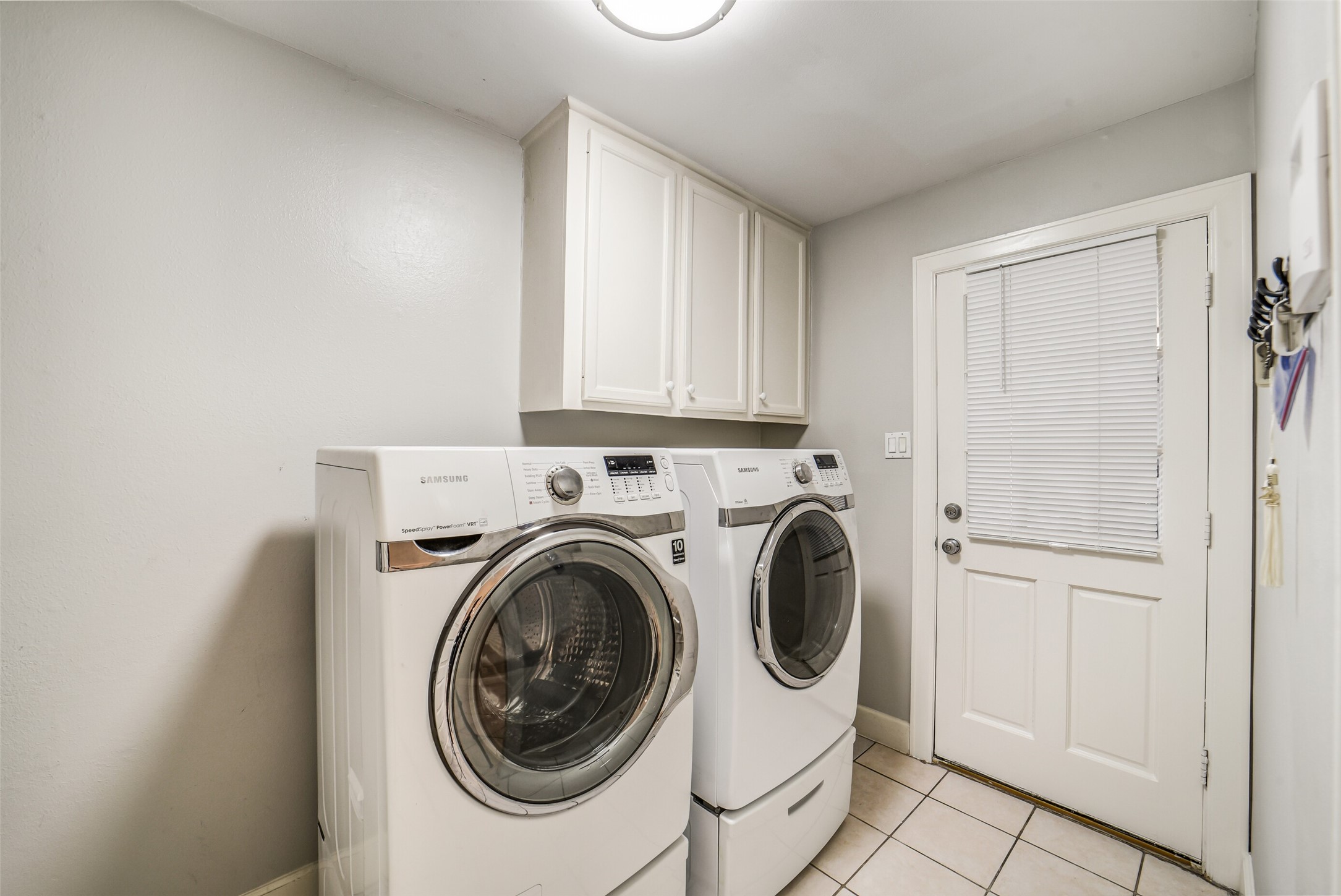 5322 Rutherglenn Drive Houston, TX 77096 - Photo 21 of 30 The perfect drop zone, utility room tucked away off the kitchen/breakfast room and direct access to covered walkway to garage.