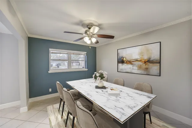 a view of a dining area with furniture window and wooden floor