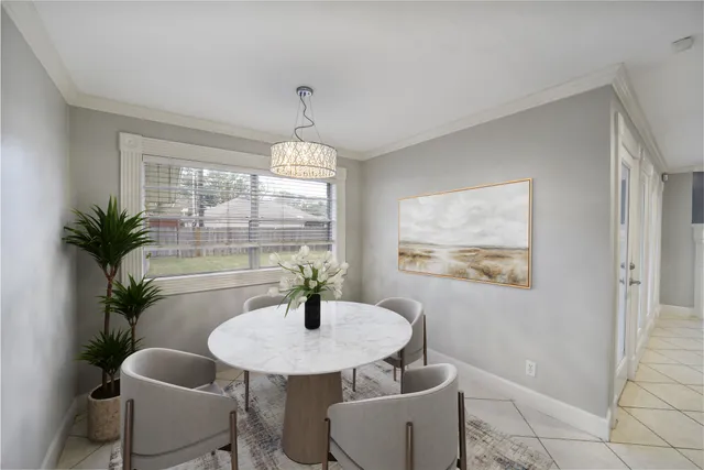 a dining room with furniture and window