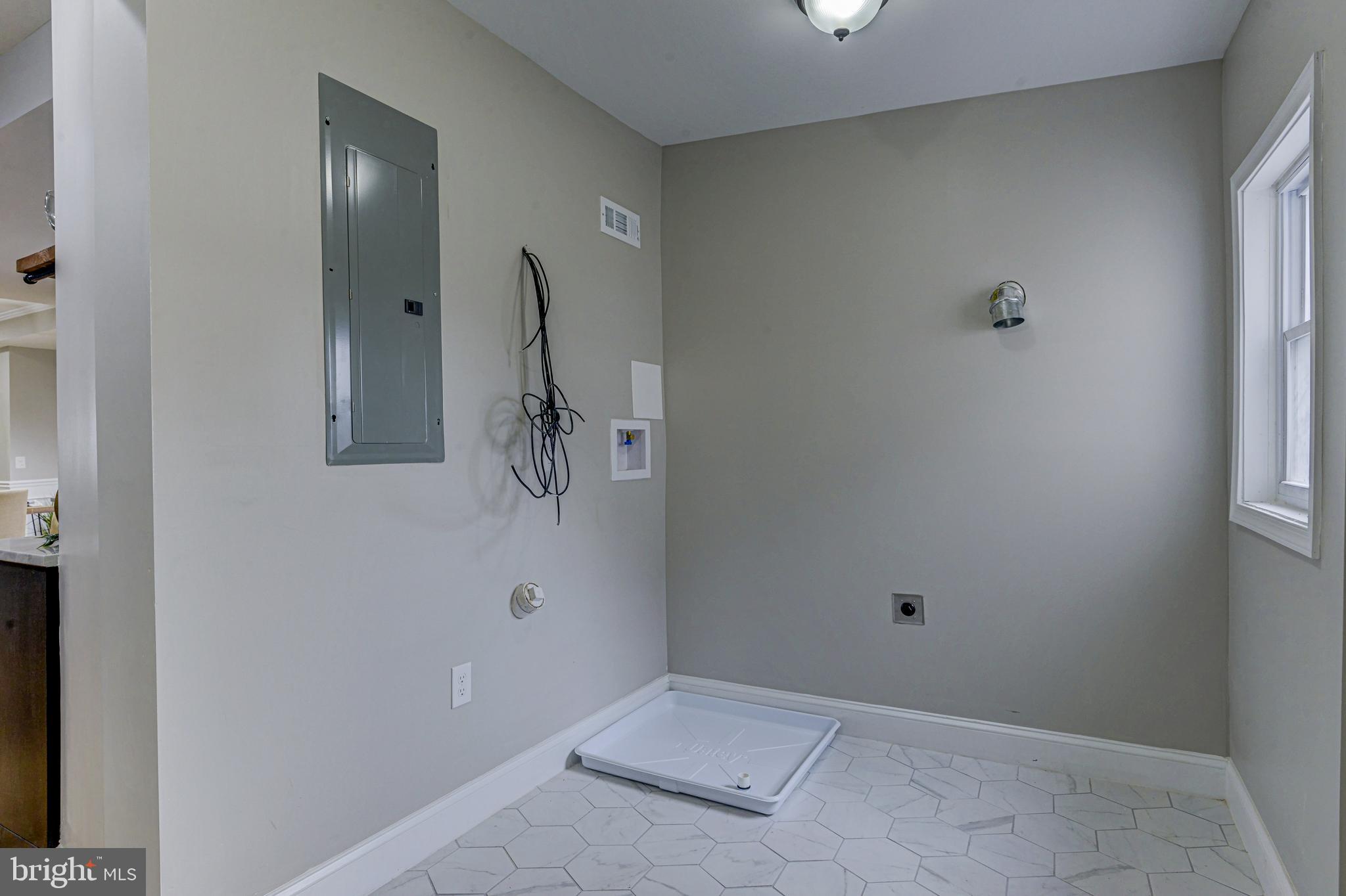 3716 Roland Avenue Baltimore, MD 21211 - Photo 30 of 55 main level laundry