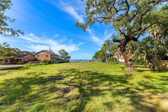 a view of a town with floor to ceiling fan