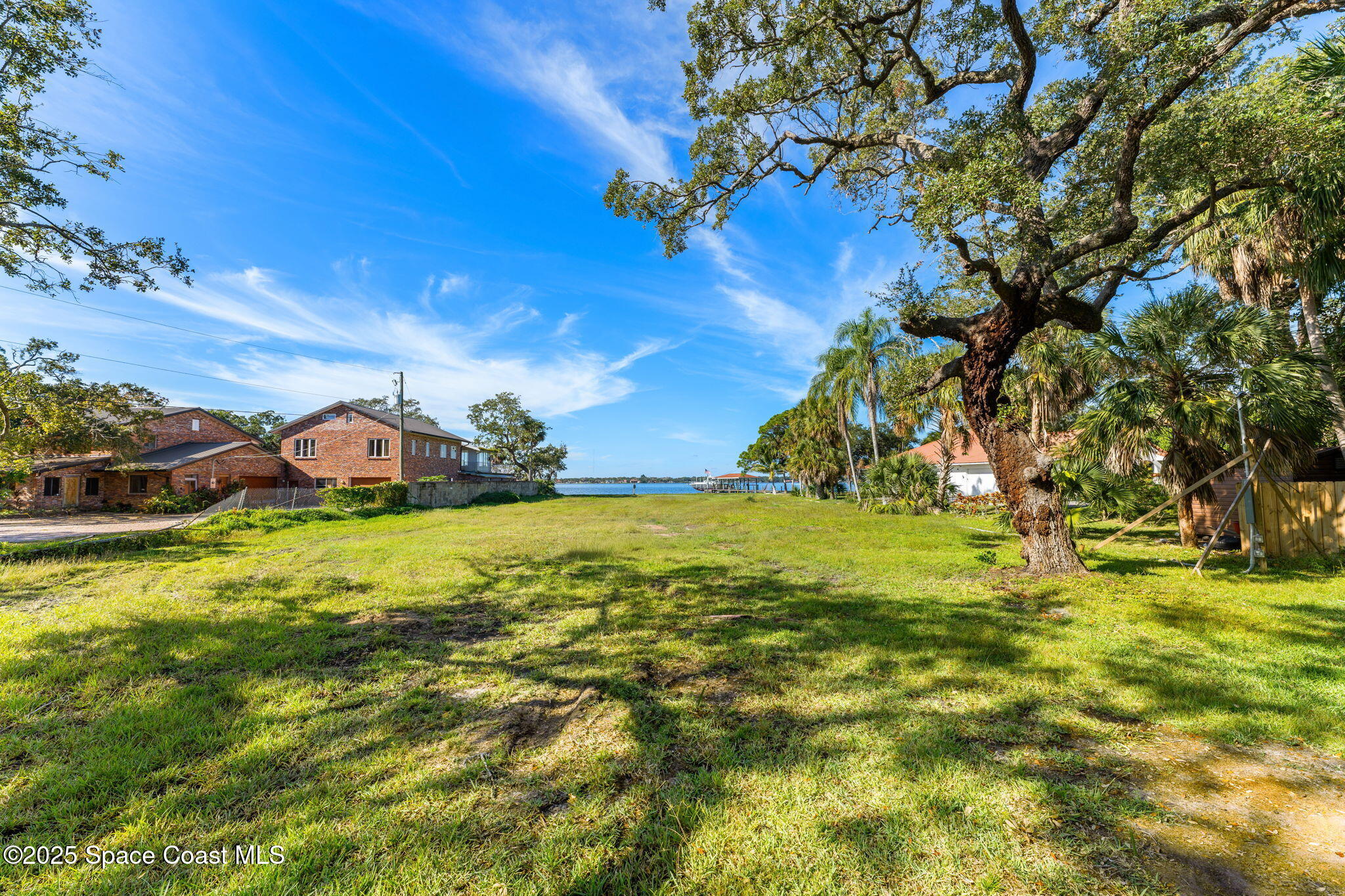 0 Crooked Mile Road Merritt Island, FL 32952 - Photo 11 of 29 a view of a town with floor to ceiling fan