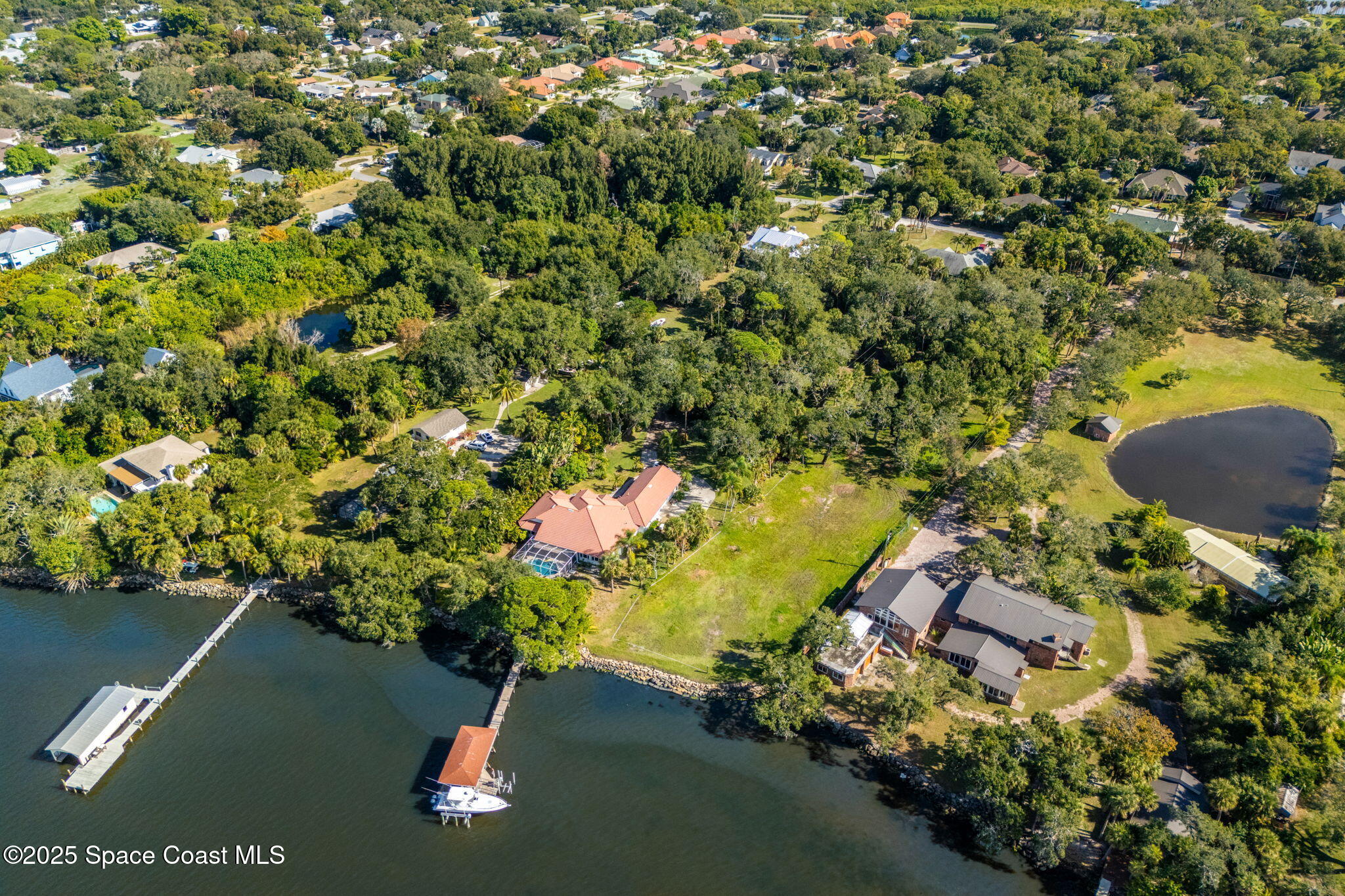 0 Crooked Mile Road Merritt Island, FL 32952 - Photo 16 of 29 a picture of a yard