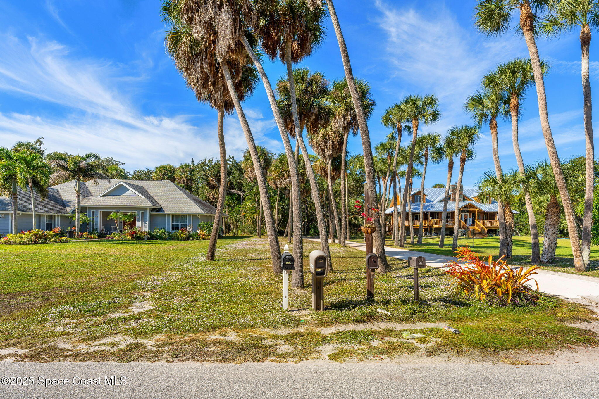 0 Crooked Mile Road Merritt Island, FL 32952 - Photo 20 of 29 a view of a house with a yard