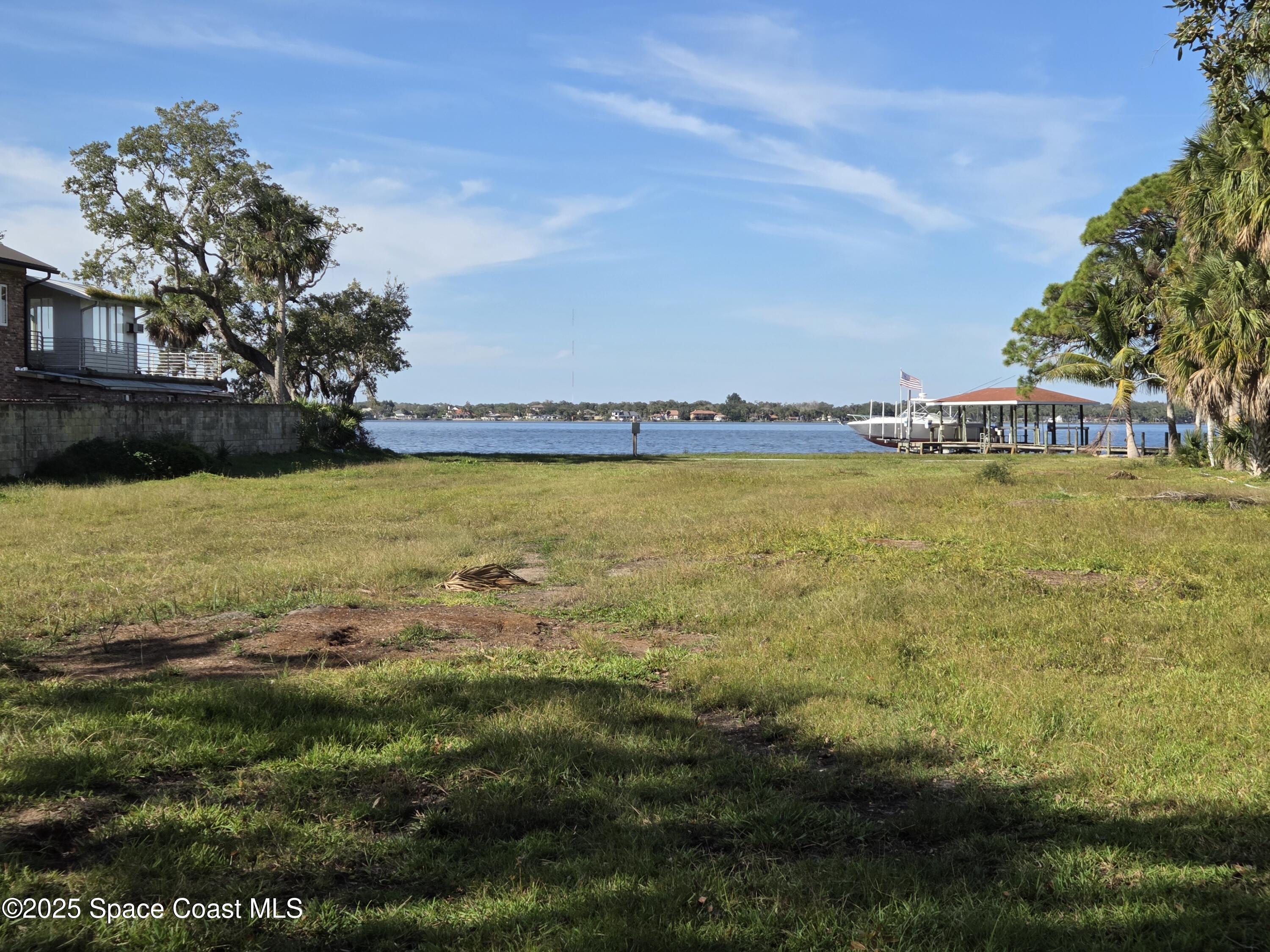 0 Crooked Mile Road Merritt Island, FL 32952 - Photo 23 of 29 a view of an ocean and beach