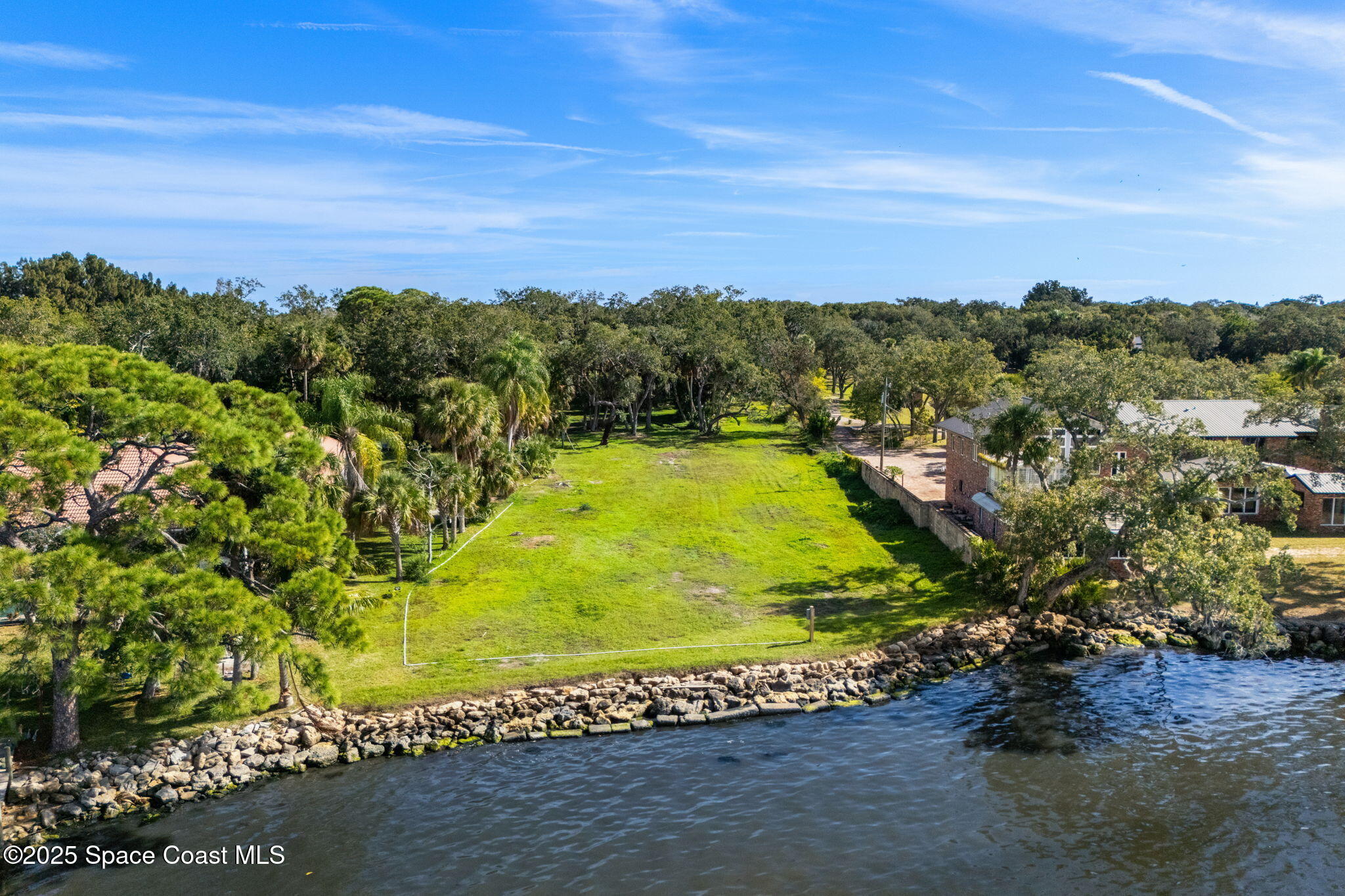 0 Crooked Mile Road Merritt Island, FL 32952 - Photo 7 of 29 a view of a yard