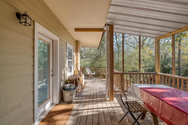 a view of a porch with furniture