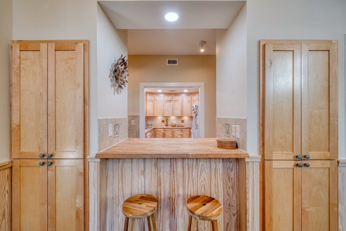 123 Bowie Trail Luling, TX 78648 - Photo 12 of 39 a view of a hallway with furniture and a window