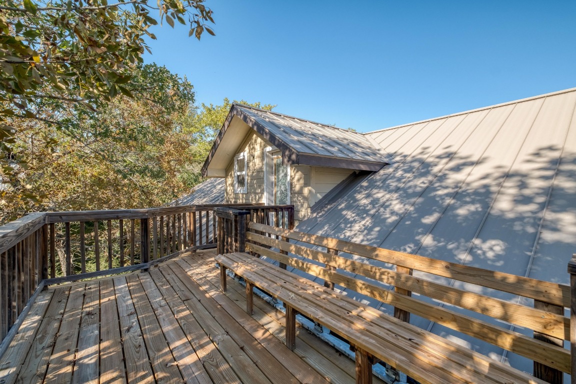 123 Bowie Trail Luling, TX 78648 - Photo 26 of 39 a view of balcony with wooden floor and fence