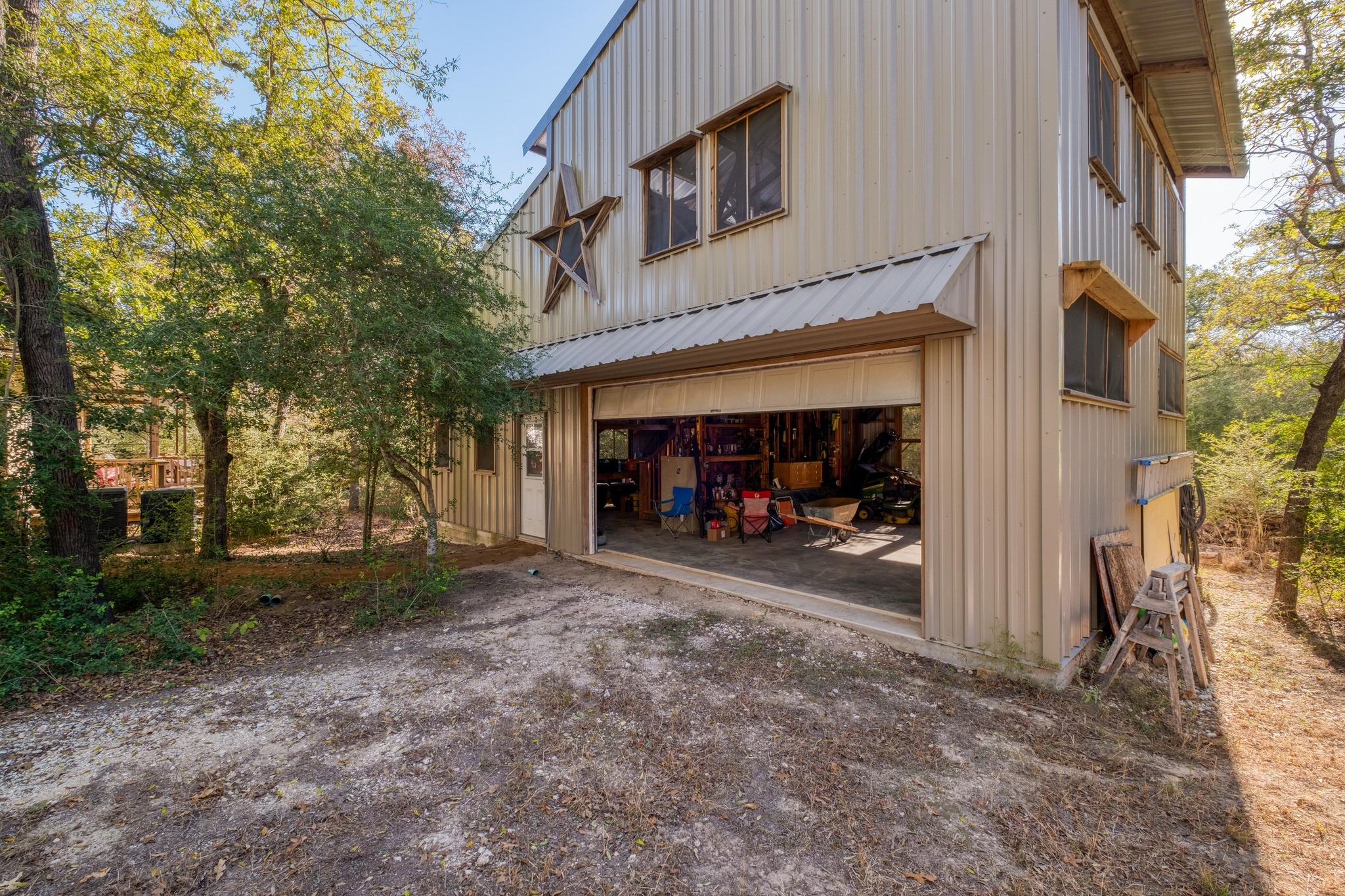 123 Bowie Trail Luling, TX 78648 - Photo 3 of 39 a view of a car park in front of a building