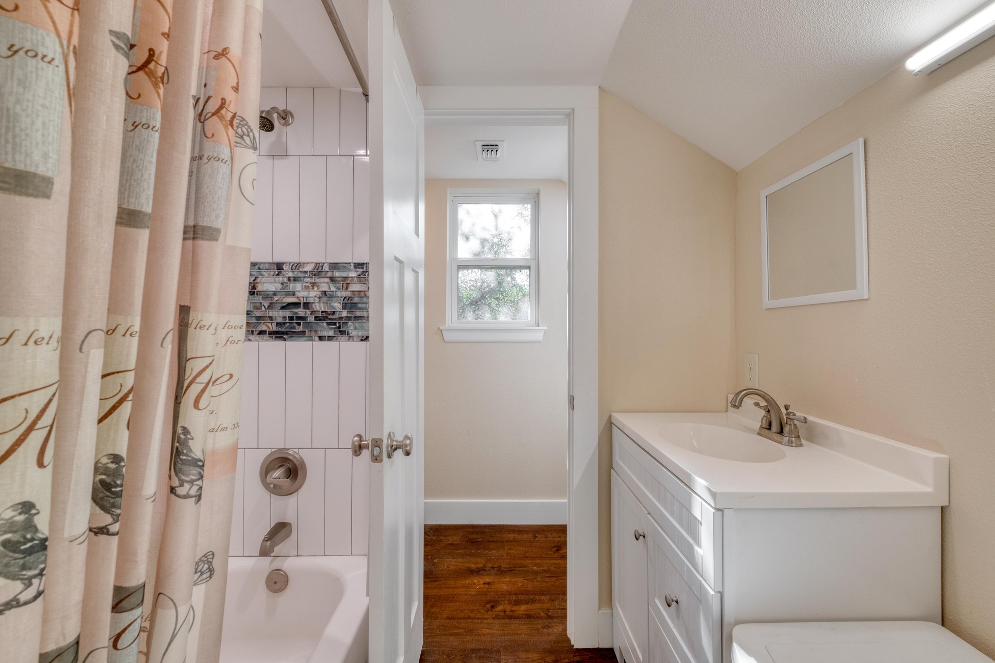 123 Bowie Trail Luling, TX 78648 - Photo 31 of 39 a bathroom with a sink a toilet and shower