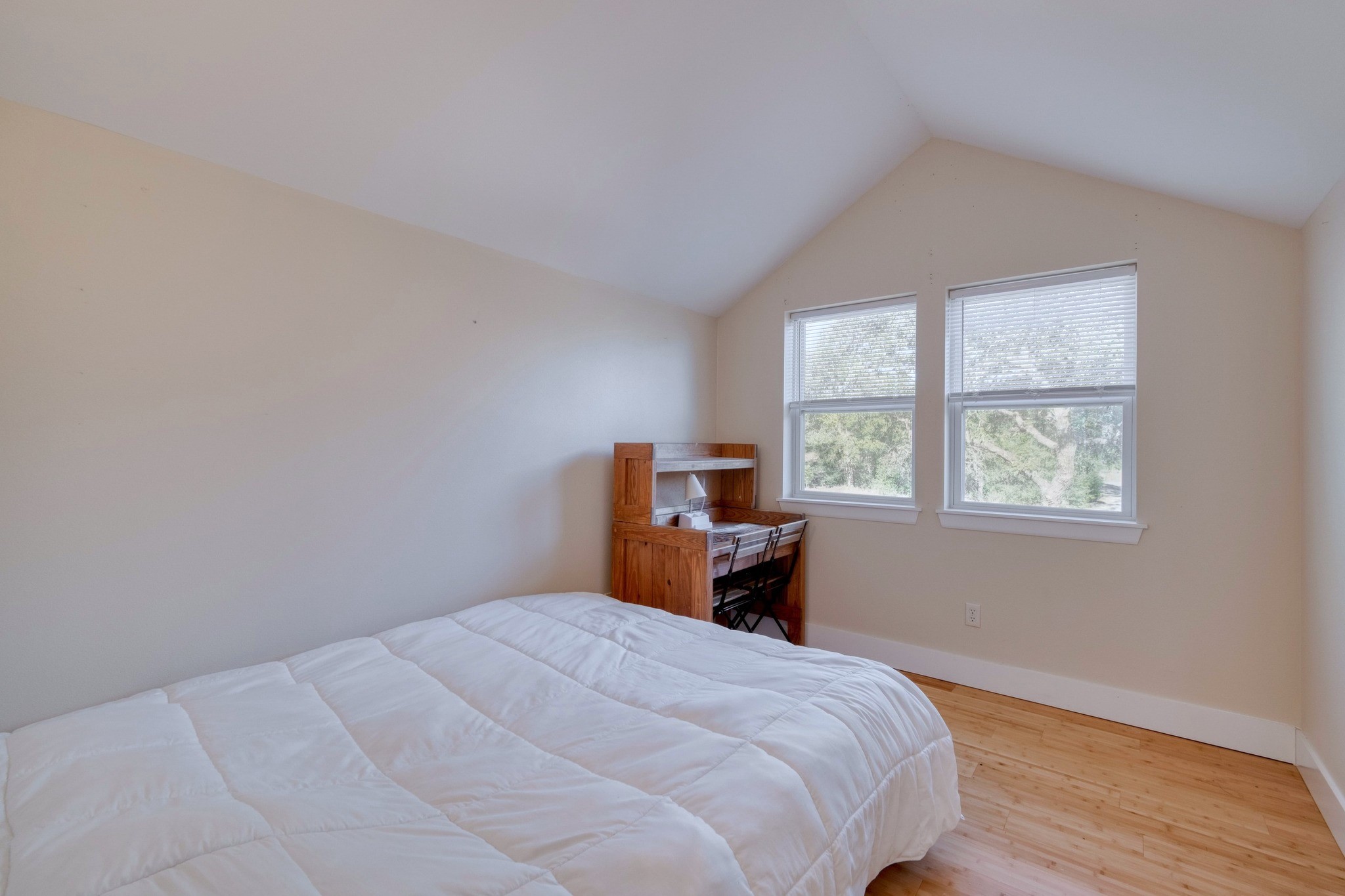 123 Bowie Trail Luling, TX 78648 - Photo 32 of 39 a bedroom with a bed and a window