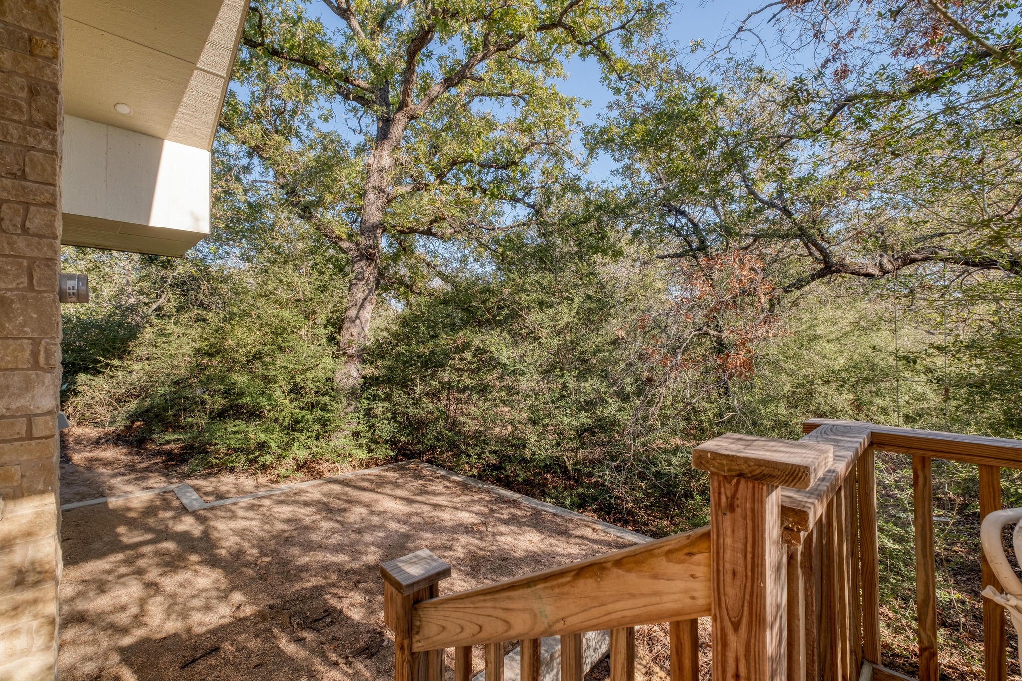 123 Bowie Trail Luling, TX 78648 - Photo 34 of 39 a view of a wooden fence and trees