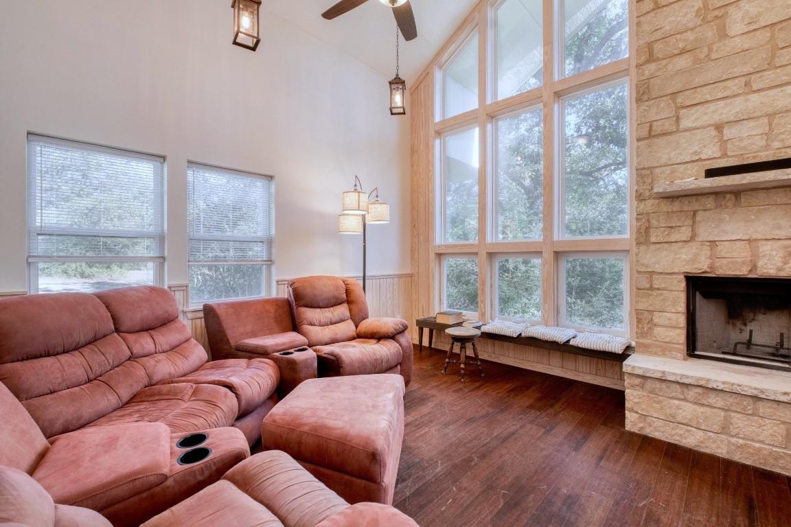 123 Bowie Trail Luling, TX 78648 - Photo 7 of 39 a living room with furniture and a fireplace