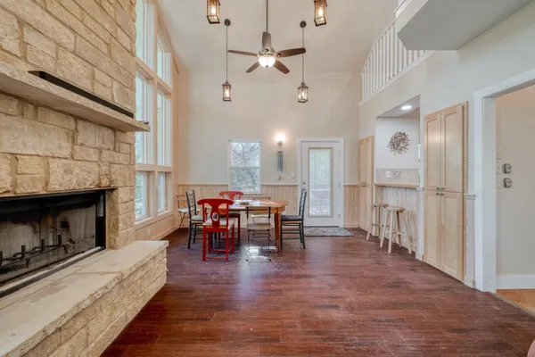 a view of a livingroom with furniture and a fireplace