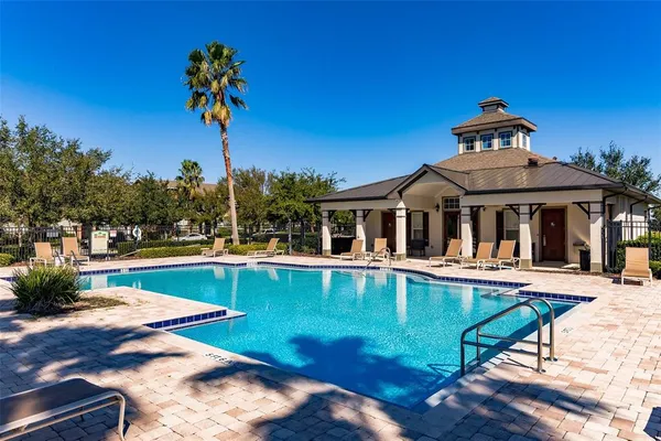 a view of a house with swimming pool