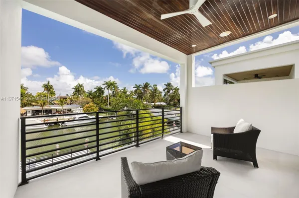 a spacious bathroom with a bathtub and a sink
