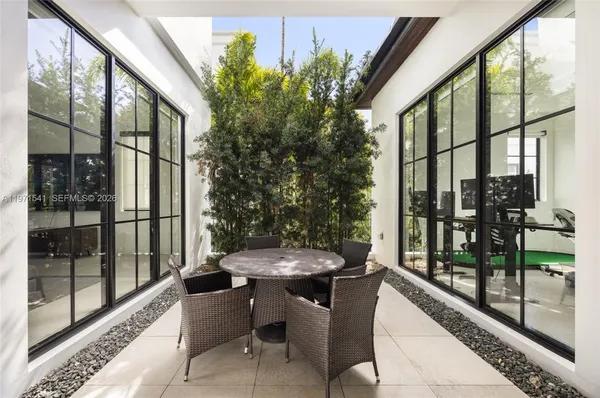 a view of kitchen with furniture and window