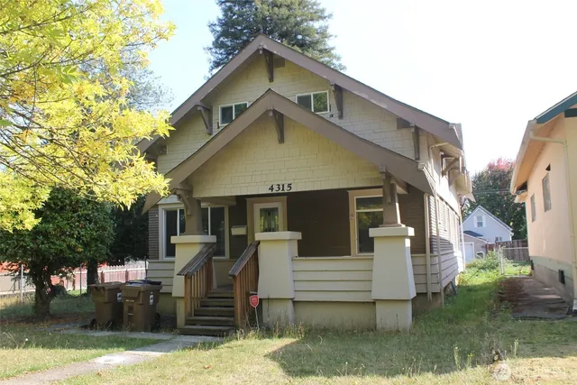 a front view of a house with garage