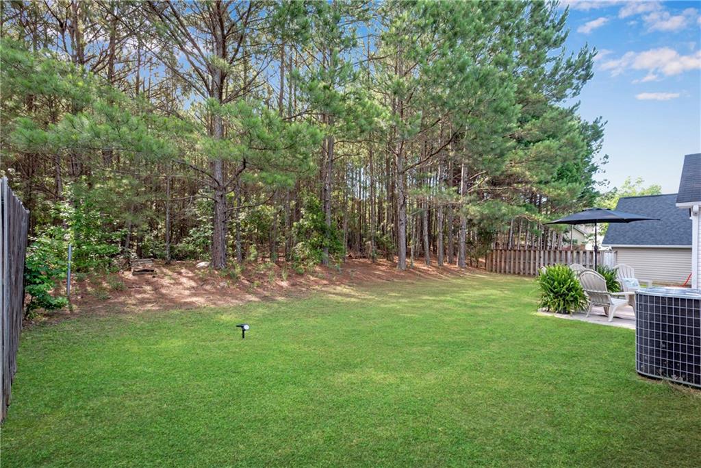125 Pine Ridge Trace Athens, GA 30605 - Photo 23 of 28 a backyard of a house with lots of green space