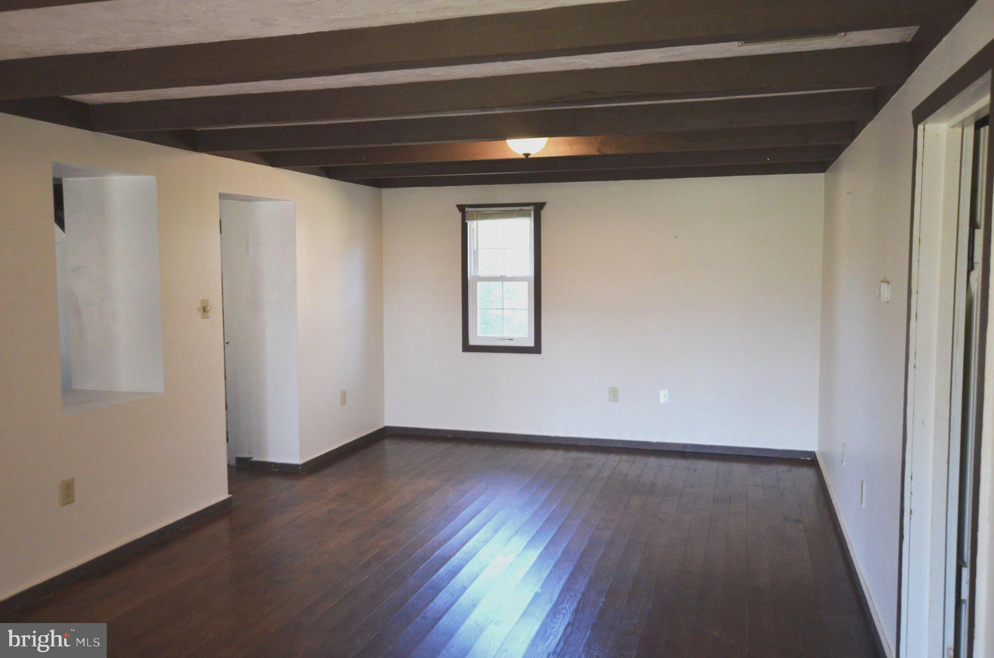 1059 Cashtown Road Biglerville, PA 17307 - Photo 16 of 32 Spacious room with rustic charm.