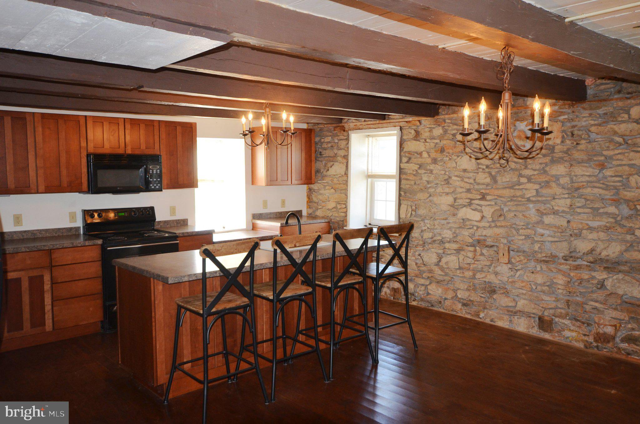 1059 Cashtown Road Biglerville, PA 17307 - Photo 24 of 32 Charming kitchen with rustic elegance.