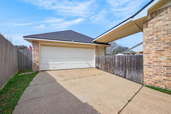 a front view of a house with a garage
