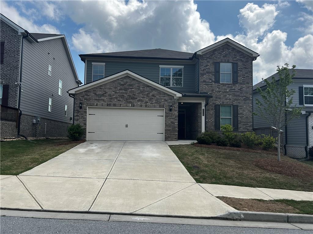3339 Fall Branch Lane Buford, GA 30519 - Photo 1 of 30 a front view of a house with a yard