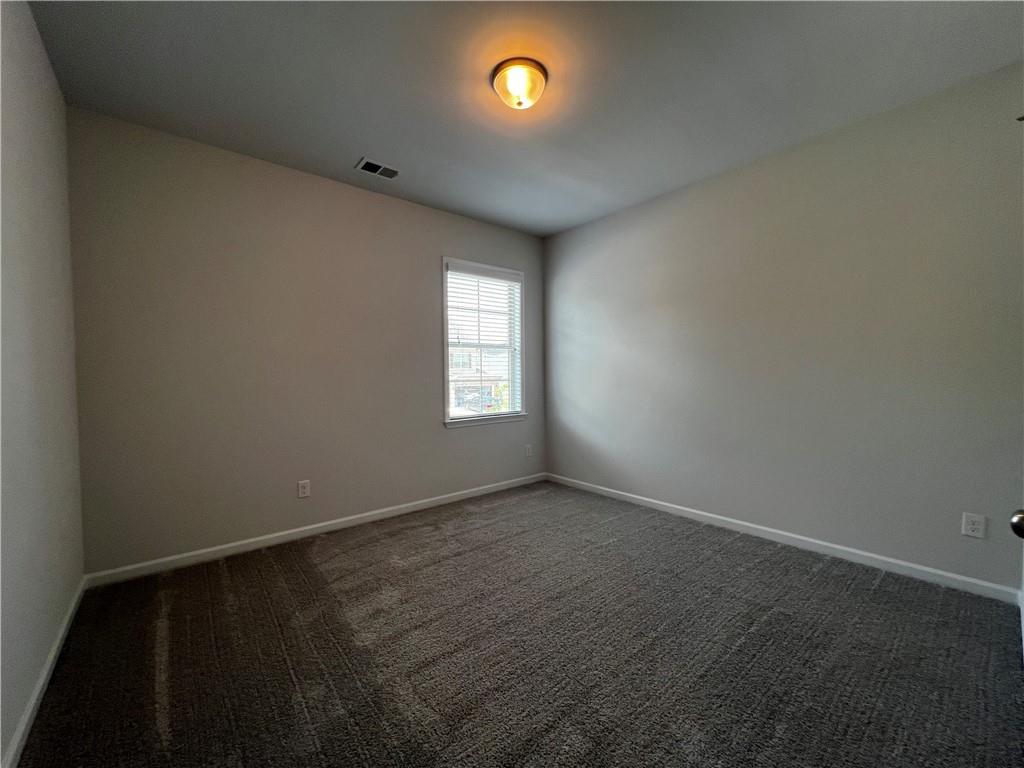 3339 Fall Branch Lane Buford, GA 30519 - Photo 15 of 30 an empty room that has a window